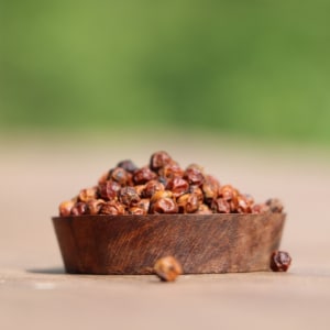 grains de poivre de Kampot rouges maturés