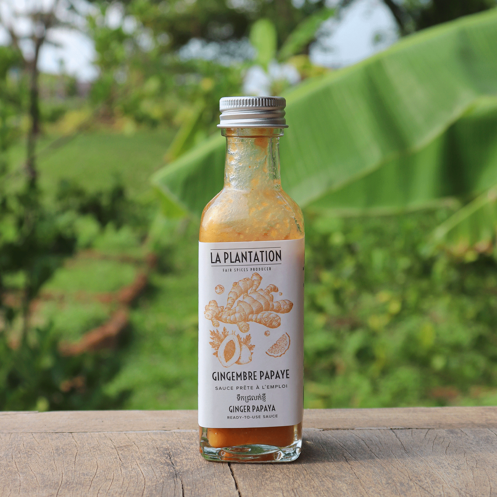 bouteille de sauce au gingembre et papaye