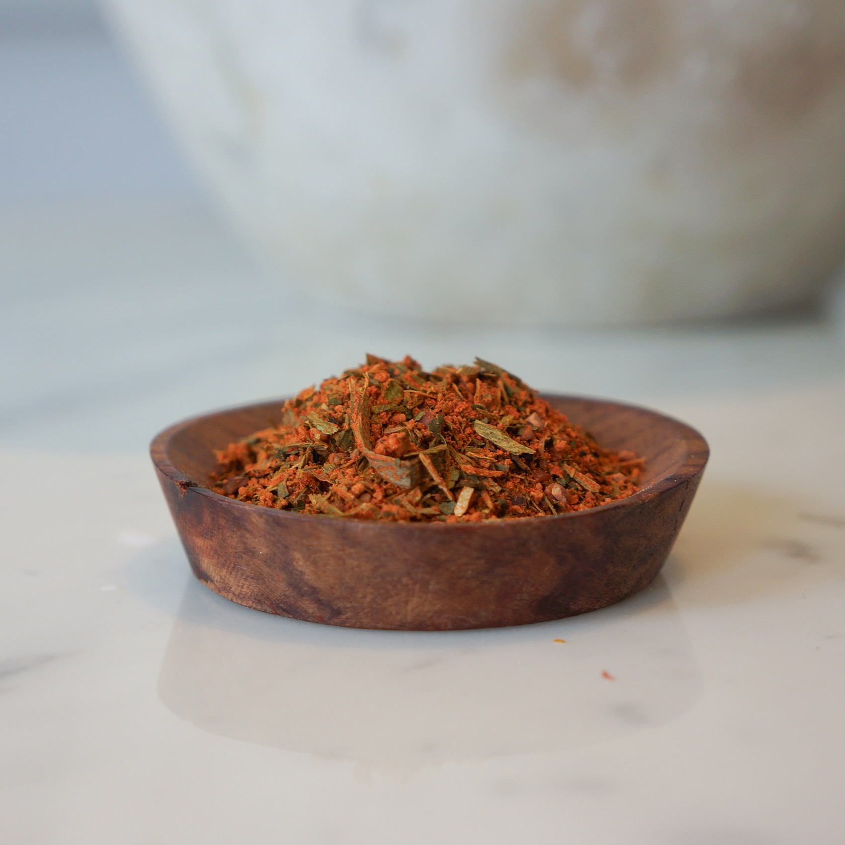 Mélange d'épices pour poulet roti dans un pot