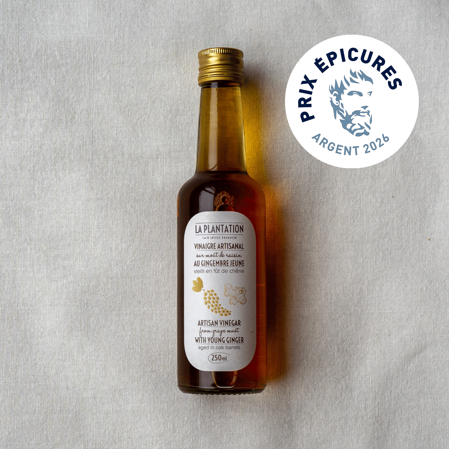 bouteille de vinaigre aux arômes de gingembre avec étiquette prix épicures