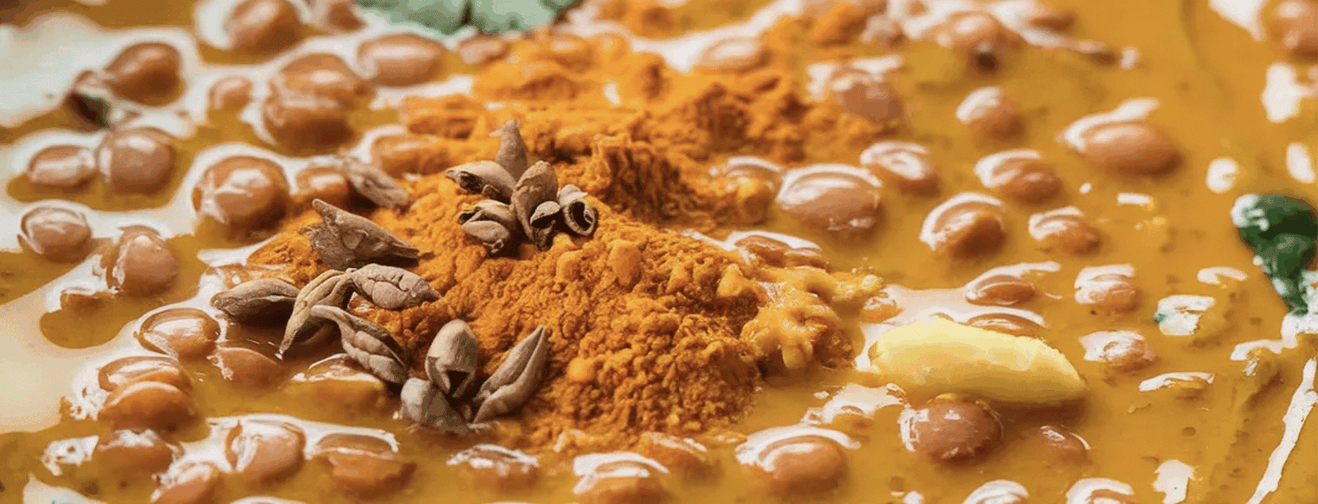 ground spices in a chickpea sauce
